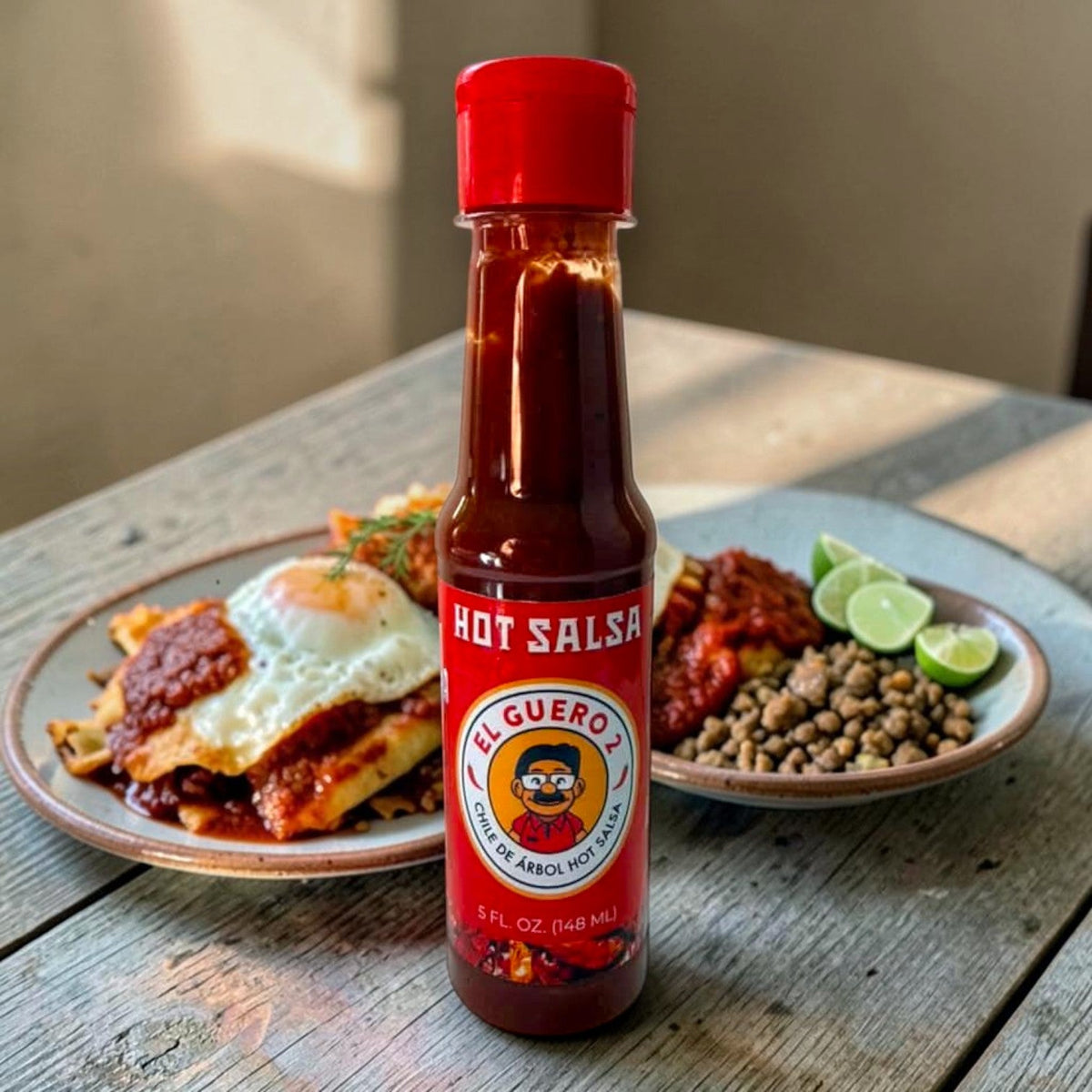 El Guero 2 chile de árbol salsa with chilaquiles, a fried egg and limes
